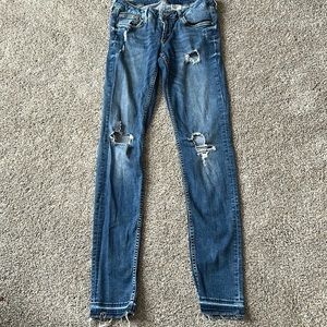 H&M distressed skinny jeans